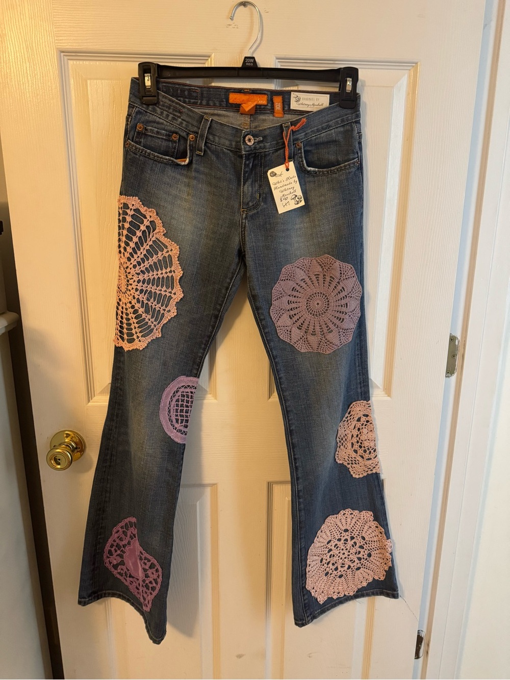 Upcycled Collins jeans with handmade knit floral design